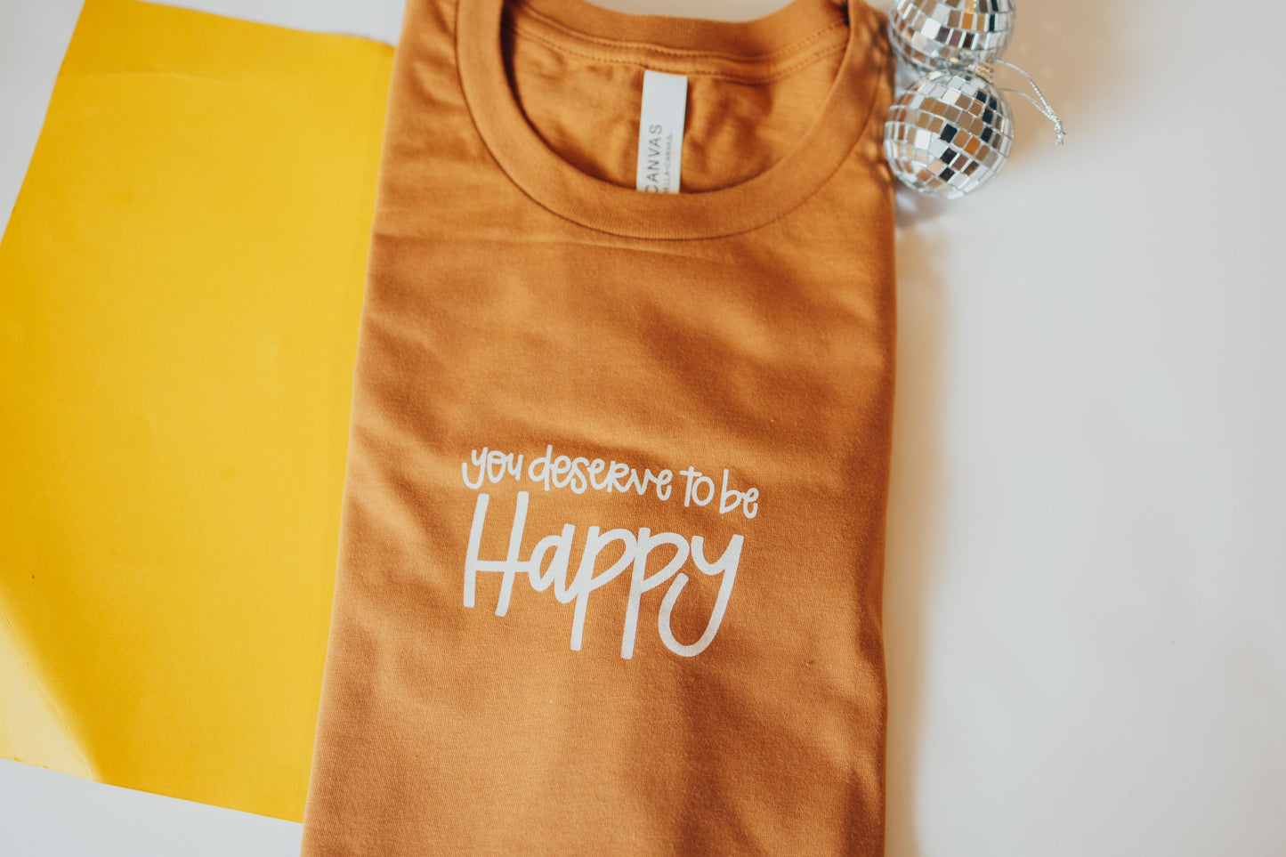 You Deserve To Be Happy Brown Short Sleeved Tee.